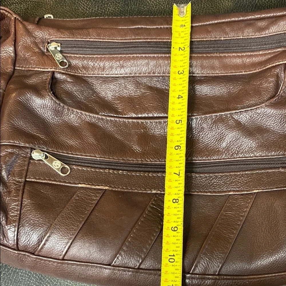 Brown Leather Messenger Bag with Adjustable Strap and Multiple Compartme…